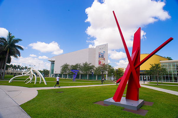 Campus visitors walk the avenue of the arts