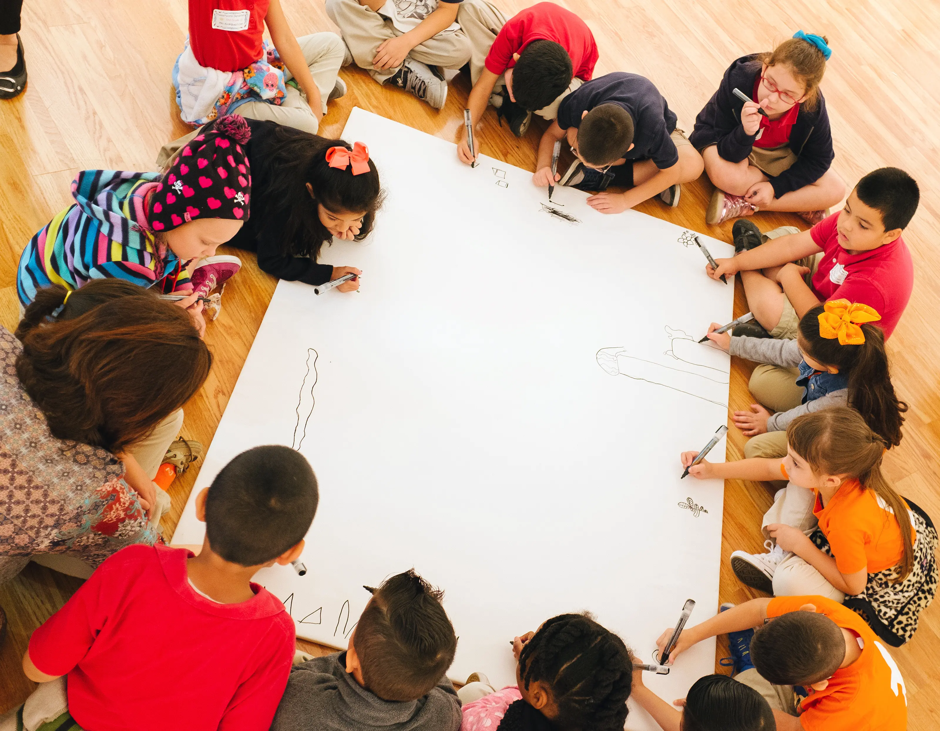 School students engaging in artmaking activity